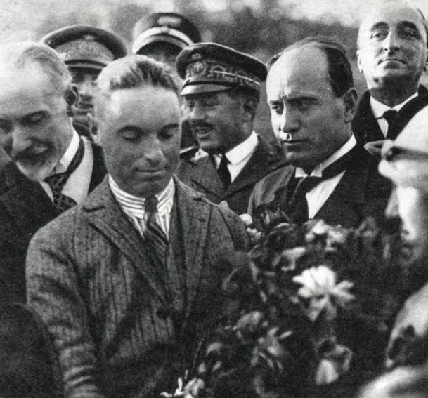 Prime Minister Benito Mussolini celebrates Italian aviator Francesco De Pinedo�s return after his 1925 round trip from Italy to Australia and the Far East. (DEA Picture Library/Getty Images)